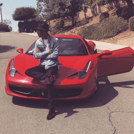 Devion Cromwell flexing with his luxurious car Ferarri 458 Italia.